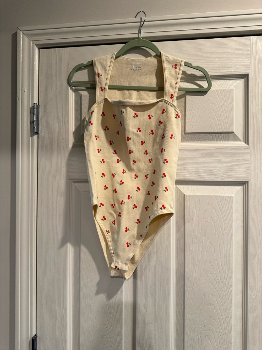 OQQ women’s  Cream Cherry-Print One-Piece Bodysuit
